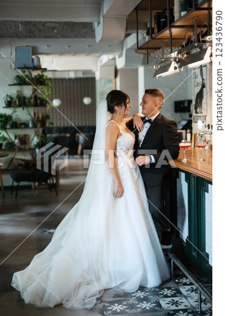 bride and groom inside a cocktail bar 123436790