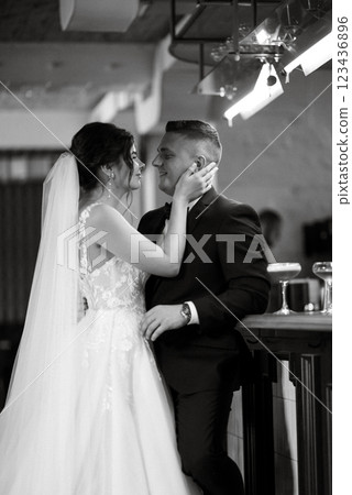 bride and groom inside a cocktail bar 123436896