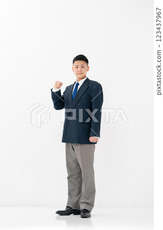 Male high school student uniform fist pump 123437967