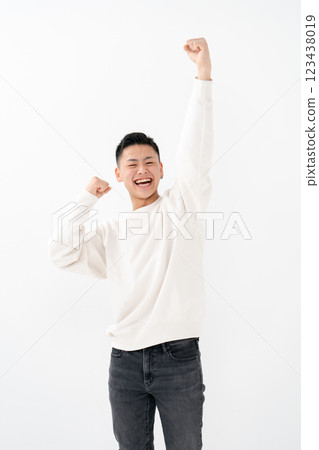 Male teenager portrait fist pump Male teenager portrait fist pump 123438019