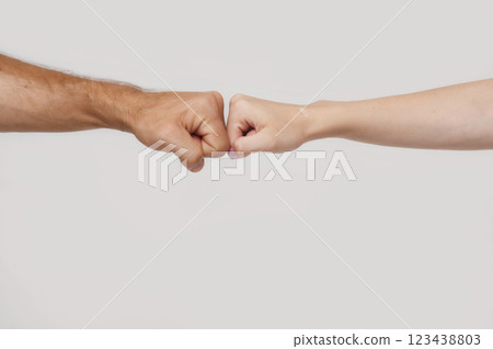 fist to fist, male and female. 123438803