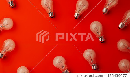 A group of light bulbs on a red background 123439077