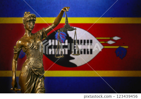 Lady Justice before a flag of Swaziland Lady Justice before a flag of Swaziland 123439456