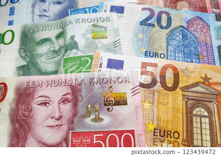 Stack of Swedish krona and Euros 123439472