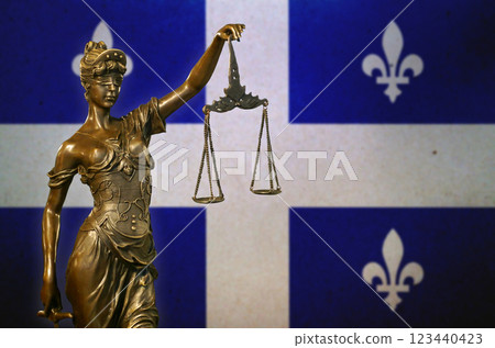 Lady Justice before a flag of Quebec Lady Justice before a flag of Quebec 123440423
