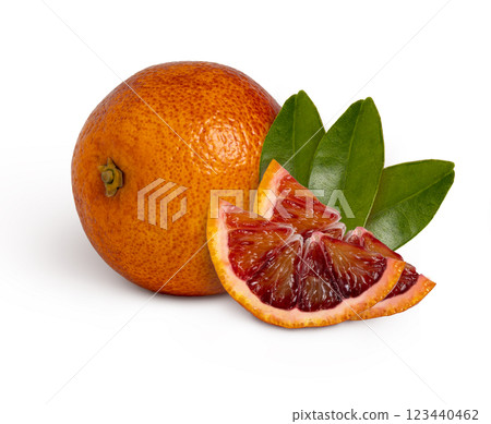 Red blood orange and slice with leaves isolated Red blood orange and slice with leaves isolated 123440462