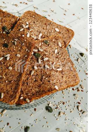 rye bread with flax seeds on a glass dish rye bread with flax seeds on a glass dish 123440638