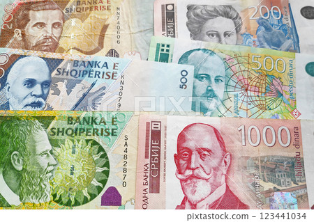 Stack of Albanian Lek and Serbian Dinar 123441034