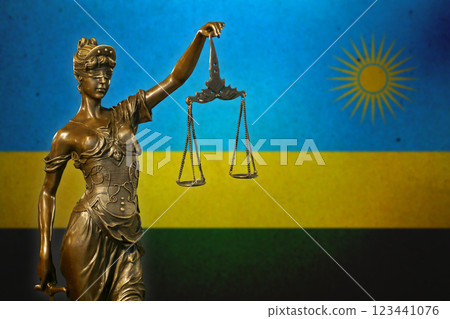 Lady Justice before a flag of Rwanda Lady Justice before a flag of Rwanda 123441076