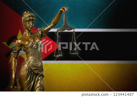 Lady Justice before a flag of Mozambique 123441487