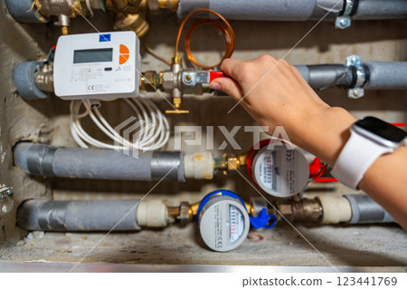 Smart water and heat meters with remote data transmission installed in a European utility system. The concept represents modern energy efficiency and digital infrastructure development 123441769