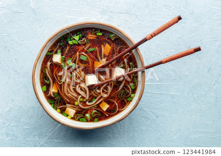 Tofu soup, Japanese cuisine. Miso soup with bean curd and green onions Tofu soup, Japanese cuisine. Miso soup with bean curd and green onions 123441984