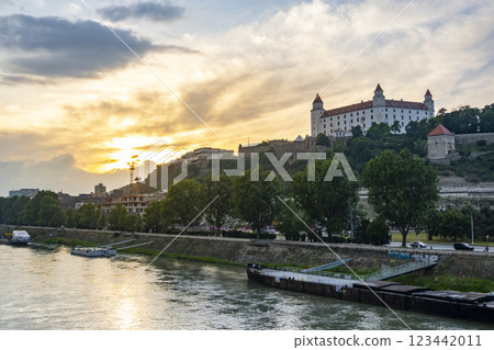 Sunset panorama of Bratislava Grad and downtown over Donau river, Slovakia capital city Sunset panorama of Bratislava Grad and downtown over Donau river, Slovakia capital city 123442011