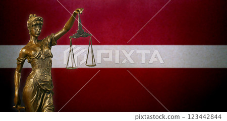 Lady Justice before a flag of Latvia 123442844