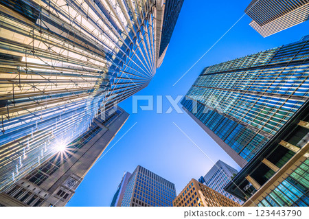 Tokyo cityscape in Japan. Warm sunshine like spring... Looking at the business district from the "Otemachi Station" intersection... A ray of hope 123443790