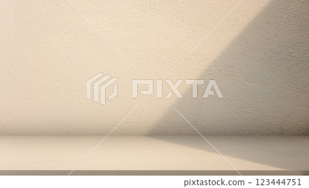 Empty golden Yellow cement wall floor and wall room loft style, Perspectives background of cement texture with shadow from the sun, Well display product and text present on free space, Luxury backdrop 123444751