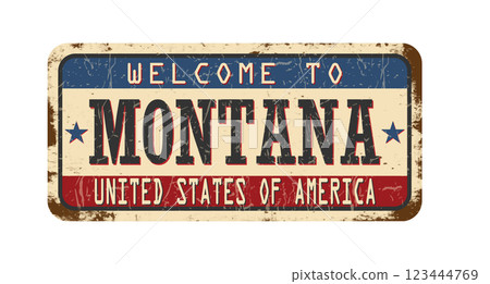 Welcome to Montana. An old worn sign with an inscription. Welcome metal plaque with rust elements 123444769