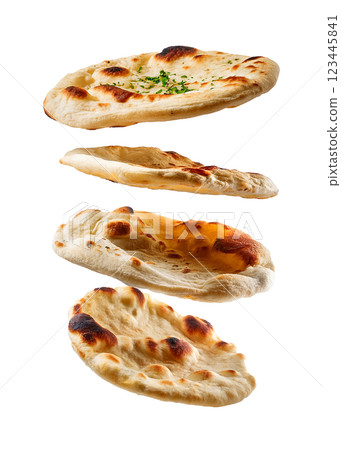 Floating Naan Bread as Traditional Indian Flatbread in Motion 123445841