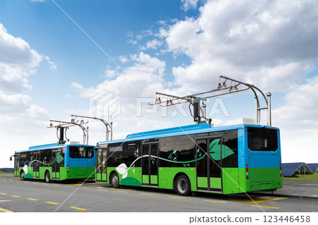 Electric buses at a bus station. Solar panels in the background 123446458