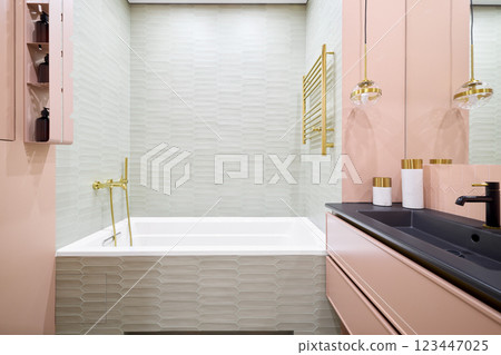 An Exquisite and Stylish Modern Bathroom Decorated with Elegant Fixtures and Soft Colors An Exquisite and Stylish Modern Bathroom Decorated with Elegant Fixtures and Soft Colors 123447025