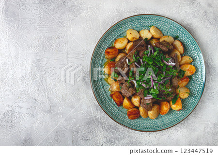 kuyrdak, roast offal with potatoes and fresh herbs, homemade in Kazakh, no people, kuyrdak, roast offal with potatoes and fresh herbs, homemade in Kazakh, no people, 123447519