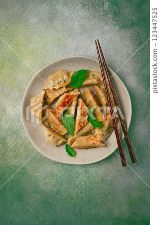 japanese fried dumplings, gyoza, sesame seeds, top view, no people, japanese fried dumplings, gyoza, sesame seeds, top view, no people, 123447525