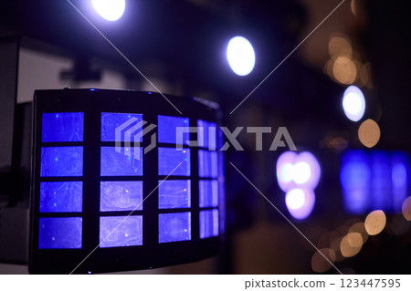 The captivating and vibrant blue lights create a stunning display in a dark setting 123447595