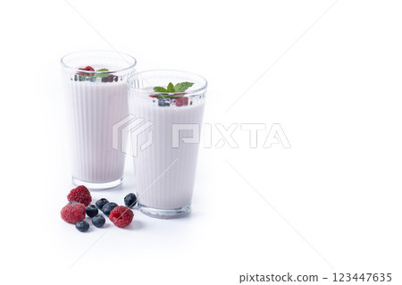 Fresh raspberry and blueberry smoothie isolated on white background 123447635