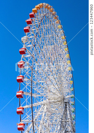 Tempozan ferris wheel at Tempozan harbor village next to Osaka Aquarium Kaiyukan. 123447960