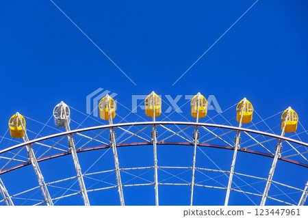 Tempozan ferris wheel at Tempozan harbor village next to Osaka Aquarium Kaiyukan. 123447961