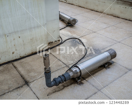 Drained fountain. A device for splashing water in a fountain.  technical device of the fountain. Technology in the park. 123448289