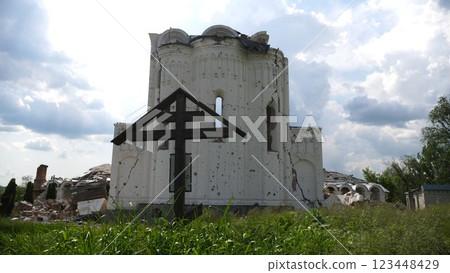 View to destroyed church at Kharkivska oblast. Ruined building after bomb attacks on ukrainian territory from russia army. Consequences of russian invasion of Ukraine. Slow motion 123448429