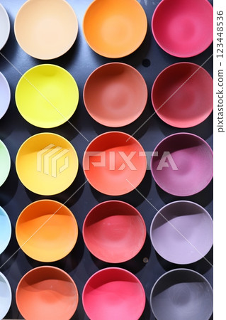 An arrangement of colorful ceramic bowls showcasing artistic design and vibrant aesthetics An arrangement of colorful ceramic bowls showcasing artistic design and vibrant aesthetics 123448536