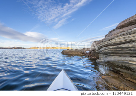 winter kayaking or canoeing on Horsetooth Reservoir near Fort Collins, Colorado - POV paddler perspective winter kayaking or canoeing on Horsetooth Reservoir near Fort Collins, Colorado - POV paddler perspective 123449121