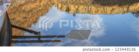 water reflection of oars of coastal sculling shell in sandstone canyon of Horsetooth Reservoir in Colorado in fall scenery 123449136