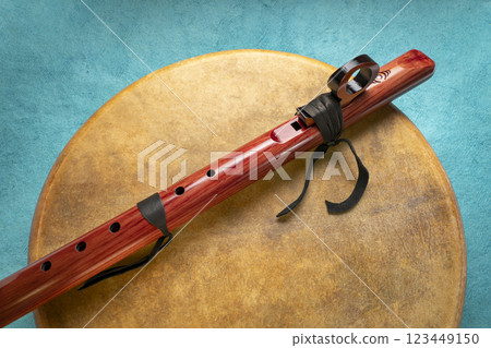 native American style flute handcrafted from aromatic cedar and shaman drum coverd by gout skin native American style flute handcrafted from aromatic cedar and shaman drum coverd by gout skin 123449150