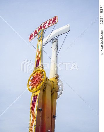 Luna park. Part of the attraction. A place for children to relax. Carousels in the park. Adrenalin. Entertainment concept Luna park. Part of the attraction. A place for children to relax. Carousels in the park. Adrenalin. Entertainment concept 123449374