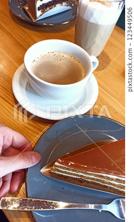 Cozy coffee break with a cup of hot coffee Cozy coffee break with a cup of hot coffee 123449506