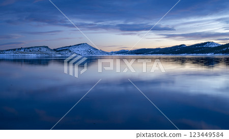 winter dusk over calm Carter Lake in northern Colorado at foothills of Rocky Mountains 123449584