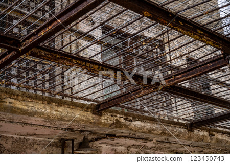 Metal grating on an upper cell block level in the Eastern State Penitentiary historic site. 123450743