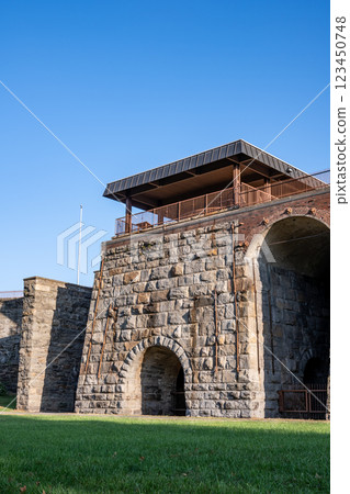 View of the ruined Scranton Iron Furnaces stone facade in Pennsylvania View of the ruined Scranton Iron Furnaces stone facade in Pennsylvania 123450748