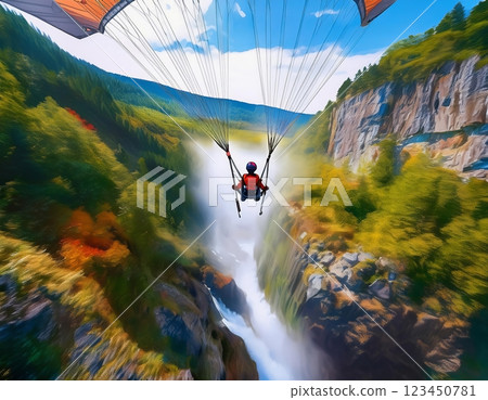 A paraglider soars above a vibrant valley with a waterfall cascading down rocky cliffs during a clear, sunny day. Generative AI 123450781