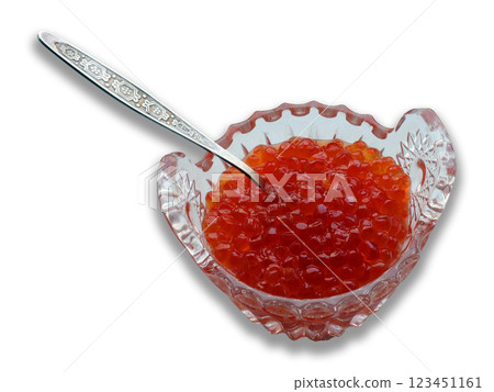 Caviar sits in a decorative vase, showcasing its vibrant red hue against a clean white background. The intricate design of the vessel adds to the visual appeal of this luxurious delicacy. Caviar sits in a decorative vase, showcasing its vibrant red hue against a clean white background. The intricate design of the vessel adds to the visual appeal of this luxurious delicacy. 123451161