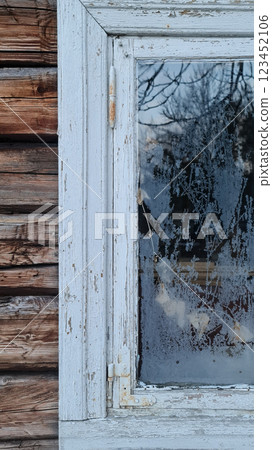 Old building with white window frame, close up 123452106