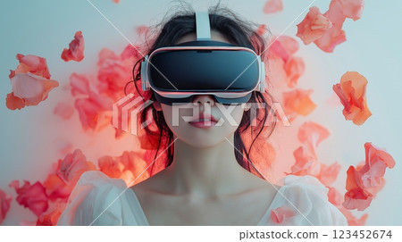 Woman immersed in virtual reality surrounded by colorful petals Woman immersed in virtual reality surrounded by colorful petals 123452674