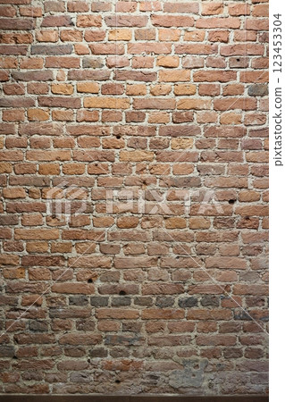 This is a captivating design featuring a rustic textured brick wall, ideal for enhancing spaces This is a captivating design featuring a rustic textured brick wall, ideal for enhancing spaces 123453304