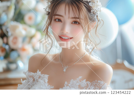 Smiling young Japanese woman in a wedding dress Smiling young Japanese woman in a wedding dress 123454222