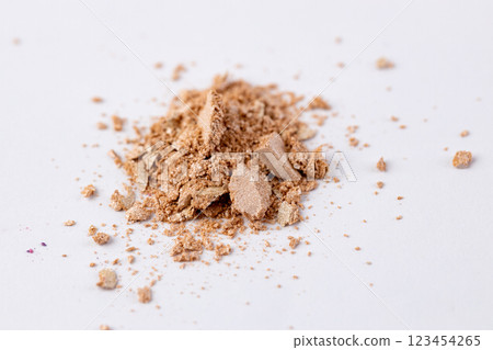 Fine Brown Powder Spread Out on a White Surface with a Soft Focus and Gentle Textures Highlighting the Material's Composition and Quality for Close-Up Photography Fine Brown Powder Spread Out on a White Surface with a Soft Focus and Gentle Textures Highlighting the Material's Composition and Quality for Close-Up Photography 123454265