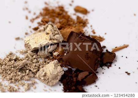 An Intriguing Arrangement of Various Natural Pigments and Powders on a White Surface Creating an Artistic Composition for Artistic Inspiration 123454280