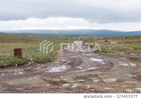 Rocky road in the tundra, heavy fog 123455577